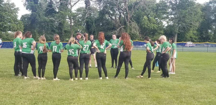 WJ+softball+huddles+together+after+their+loss+to+Catonsville+in+the+state+quarterfinals.+It+was+a+record+breaking+season+for+the+team.