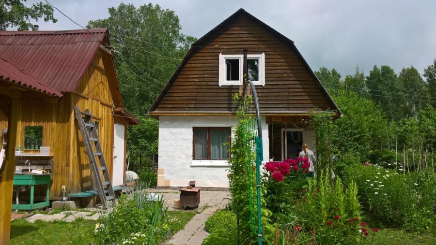 In Siberia, Russia, villagers reside in small farm-like houses made of stone and wood. Korotaev spent his summers in the village, harvesting potatoes, and tending to chickens, rabbits, and cows.