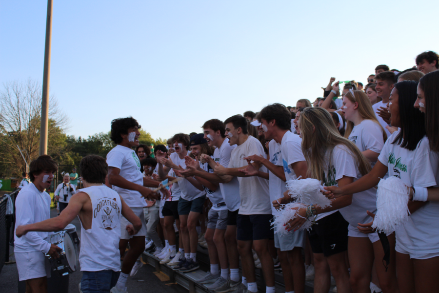 Walter Johnson students cheer on the WJ football team at the first game of the season. The game took place at Churchill High School on September 8.