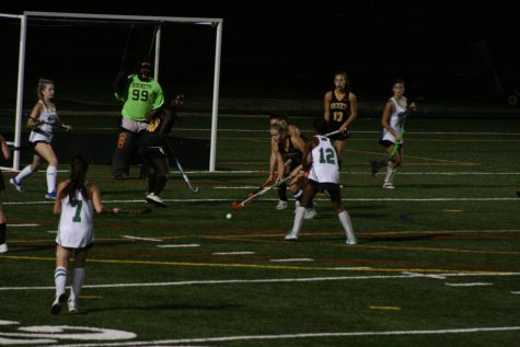Lily Delp plays aggressive offense against RM. She would finish the game with a 4 goal haul.