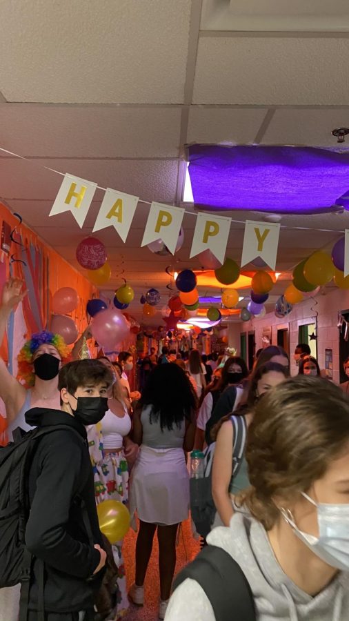 Students tour the freshmen hall where students sing Happy Birthday and hand out party hats. From the ceiling decorations to the mood lighting, you could tell freshmen put a lot of effort into their theme.
