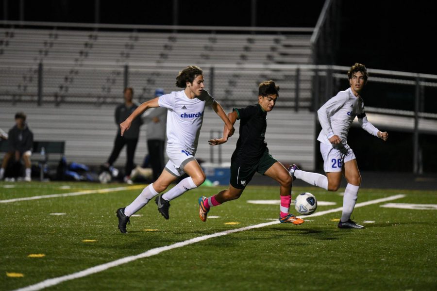 Bardinho Hormozi rushes past Churchills defenders to get to the ball first and take a shot. WJ won this game 3-1 with 2 goals from Hormozi. Hormozi often uses this speed to beat defenders when he does not have control of the ball.