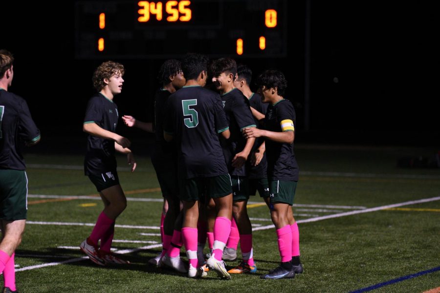 The Wildcats celebrate a goal as they take the lead against Churchill. WJ went on to win 3-1.