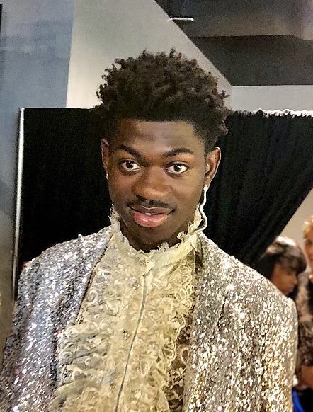 Lil Nas X gets ready backstage at the 2019 MTV Music Video Awards. Lil Nas X blew up following the success of Old Town Road, a song that combined elements of country and rap to create a hit with cross genre appeal.
