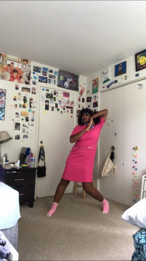 Senior Eleora Ephrem dances in her bedroom. Ephrem began posting dance covers of songs at the beginning of quarantine.