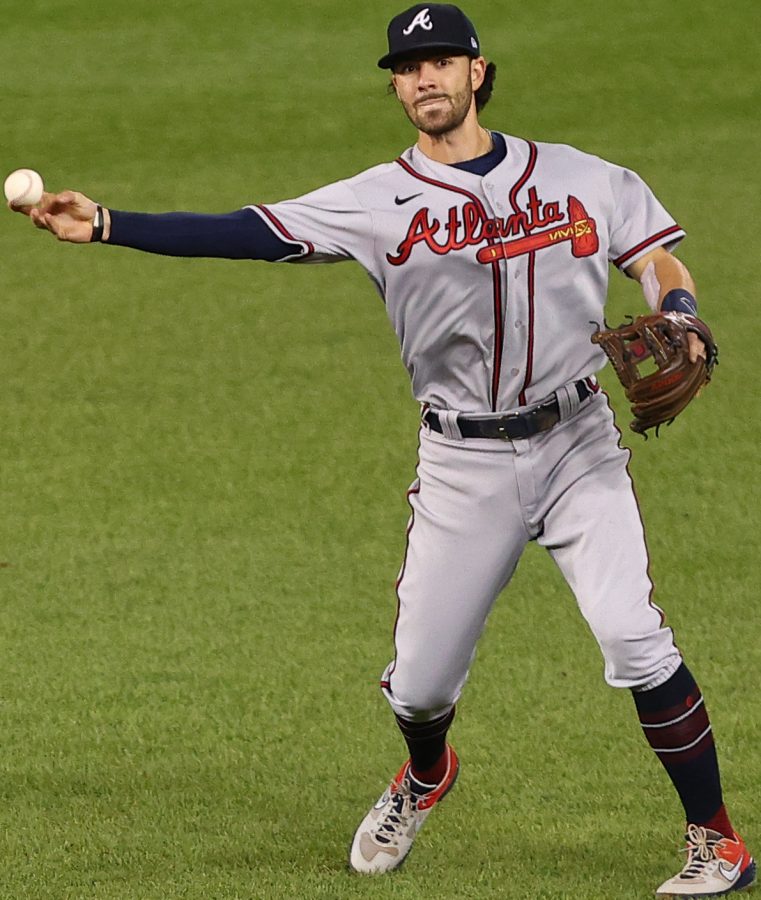 Shortstop Dansby Swanson of the Atlanta Braves fields a ground ball. Swanson has played a key role in Atlantas surprise run to the NLCS this year both in the field and at the plate.