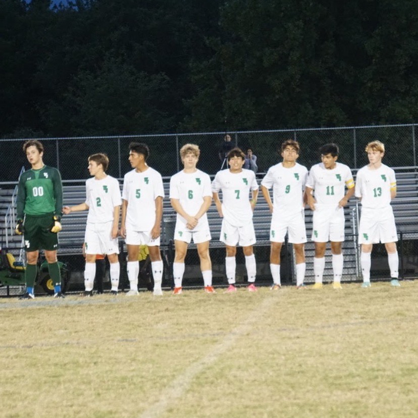 WJ soccer players stand eager on the sideline ready to play as they wait for the whistle against Clarksburg. From left to right, Sammy Gramlich, Dan Avillo, Jose Gutierrez, Will Dash, Thomas Poliseno, Bardia Hormozi, Fernando Ibarra, Nik Avillo. WJ ended up beating Clarksburg 2-0.