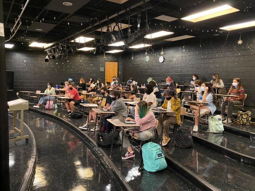 Walter Johnson S*T*A*G*E students sit together and prepare for their upcoming fall show. In-person school has returned after nearly two years of online rehearsals.