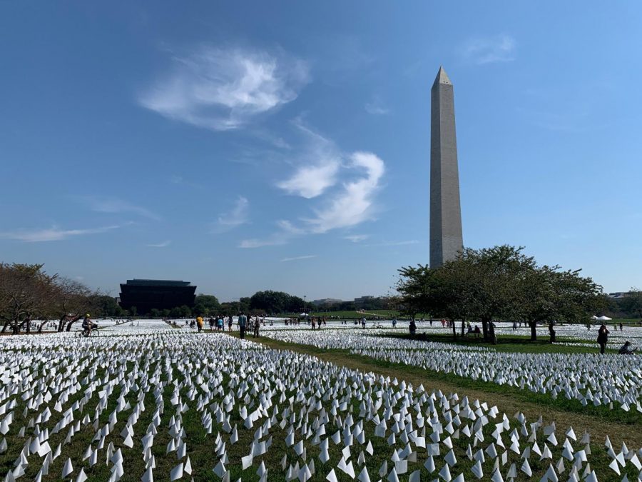 On Oct. 2, volunteers came to help create a virtual map of the 600,000 white flags representing Americans who died from Covid. A group of volunteers came from WJ led by ceramics teacher Stephanie Ellis.