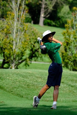 Senior captain Jacob Wu-Chen admires his drive. The dedication to his swing is one of the many reasons why he qualified to represent WJ at States.
