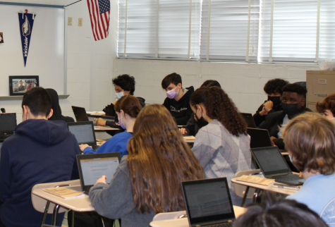 English 10 students work on an assignment in room 194. Throughout MCPS a discussion about the diversity gap is being held, as the student body is more diverse than its staff counterpart.