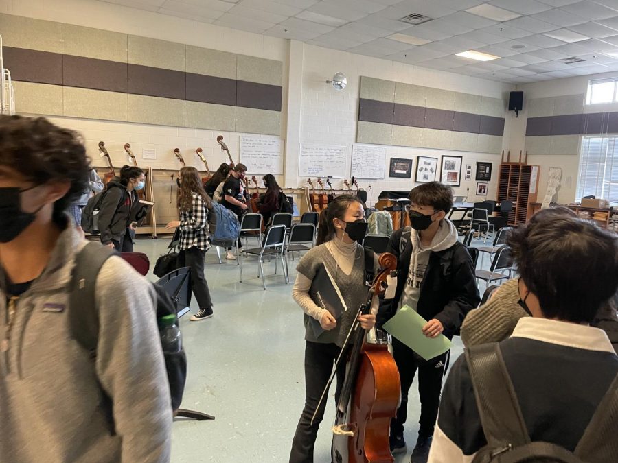 Symphonic Orchestra students rehearse together in class. Many of these students spend their after school nights rehearsing in addition to in-class practices, especially as their winter concerts approach.