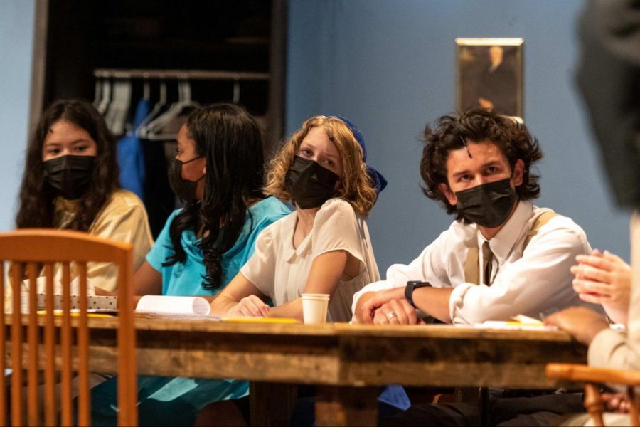 From left: Senior Abby Dodd, junior Olivia Profit, sophomore Maddy Moses and senior Grant Mateo discuss and debate about the evidence provided in the case. “Every work of literature has a protagonist and an antagonist, but with a show like this one, the lines are blurred,” Mateo said. “Its not so much that anybody walks in being evil or good, its just everybody goes in with their own personal bias. It’s a reflection of human nature.”