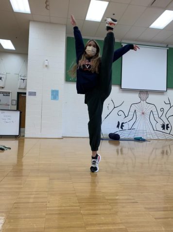 Junior Ida London shows off her flexibility in her new choreography. She taught a combo in the last dance club meeting.