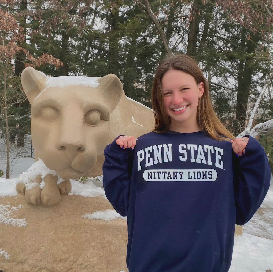 WJ junior Sienna Karp standing besides the Penn State Nittany Lion mascot to announce her verbal commitment to Penn State University for swim and dive.
Penn State is the right place for me so I am honored that they would have me as a part of their team, Karp said.