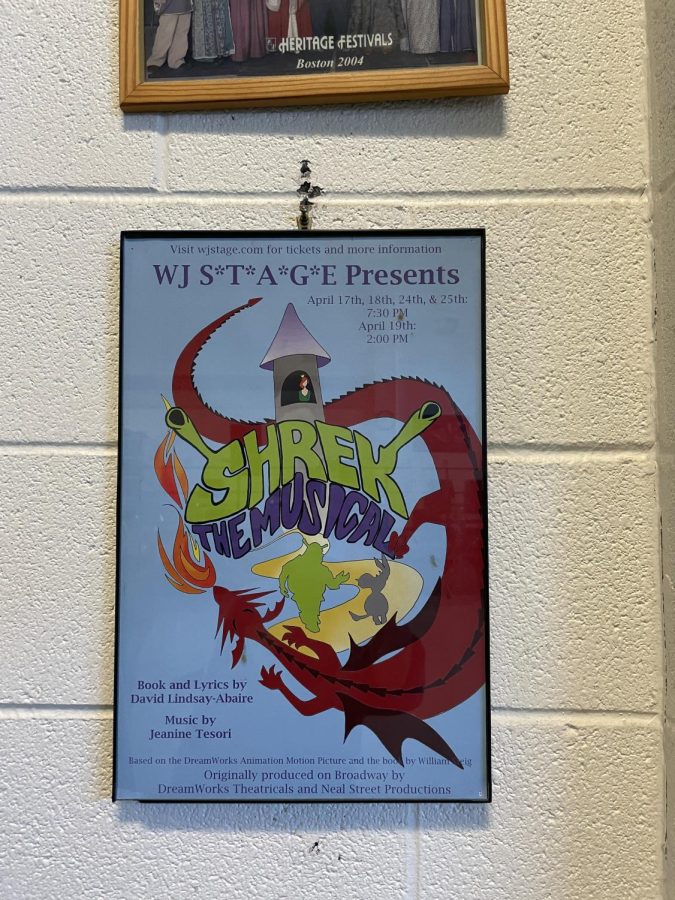 The poster for the past WJ S*T*A*G*E production of Shrek hangs in the chorus classroom. The recency of this past production caused students to be surprised when Shrek was announced as the musical for this spring.