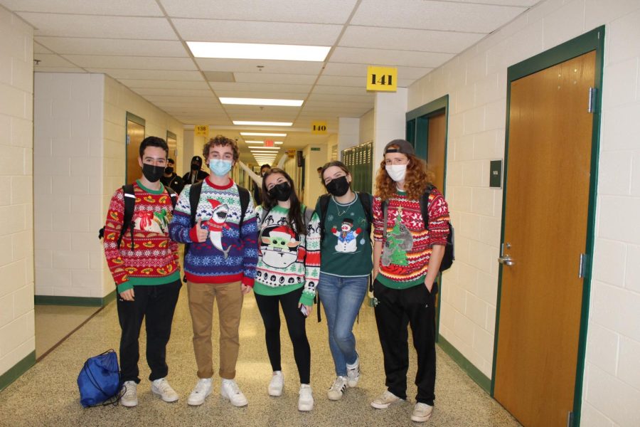 From right to left: Adam Brodsky, Max Kaminski, Marissa Krantz, Julia Levine, Zeke Ross on their way out to G Square during lunch were all dressed up in their Holiday Sweaters. These seniors went all out for their last December spirit week.