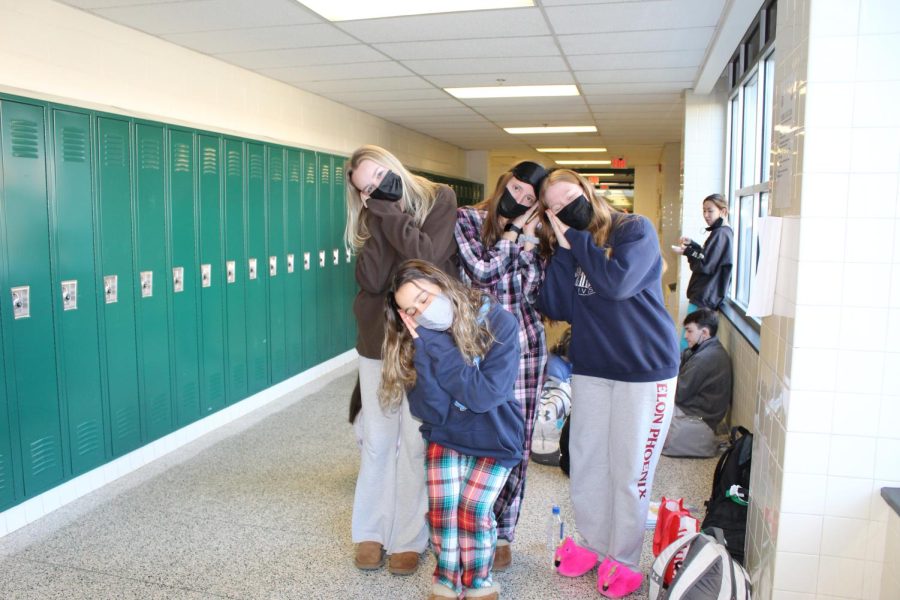 From left to right (top row): Ella Barrett, Taryn Dalton, Sinead Longsworth. (Bottom row): Gretchen Klotz all zonked out due to the stress that Senior year imposes. Dress up or Dress down spirit Monday was beneficial as it allowed these tired seniors to get some extra sleep.