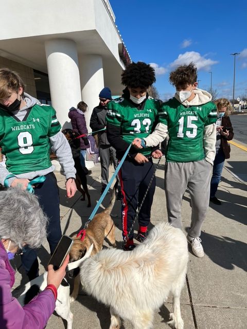 The+Walter+Johnson+football+team+donates+and+volunteers+at+the+K-9+Lifesavers+dog+shelter.