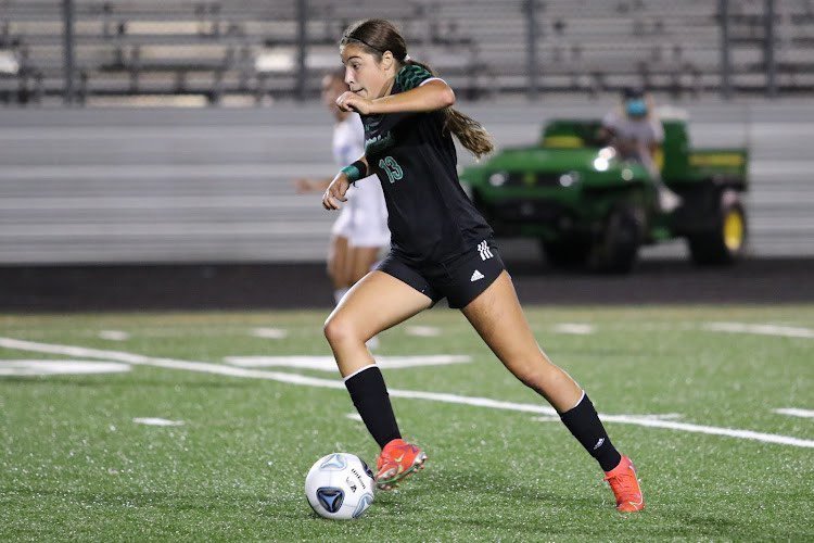 Sophomore Marina Thorn looks for an attacking opportunity against Clarksburg. The game resulted in a 6-0 win, with a scintillating performance from Thorn, who grabbed a goal and an assist.