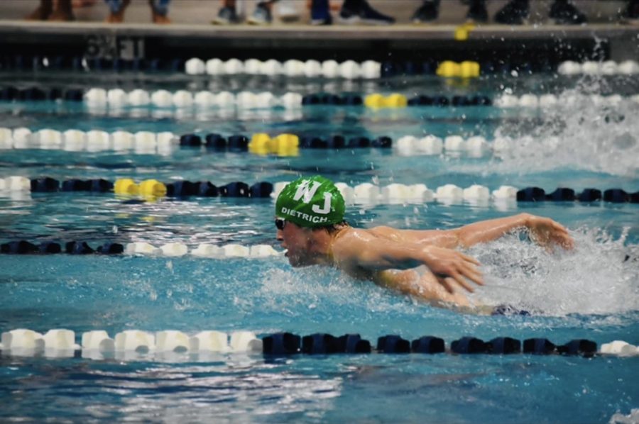 Junior Theo Dietrich sprints to the finish when swimming butterfly. Im happy with how the team did this year and I cant wait to do it again next year, Dietrich said.