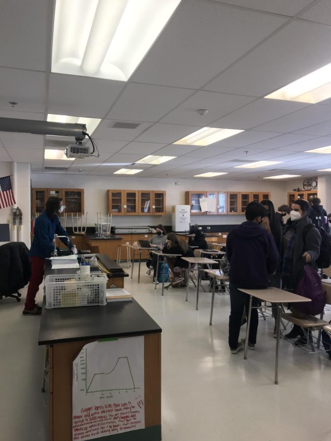 Adam Zeitlin teaches Honors Physics to his junior and senior class. Zeitlin had to learn to balance in person schooling with students who chose remote schooling or were out to do Covid-19 exposure.