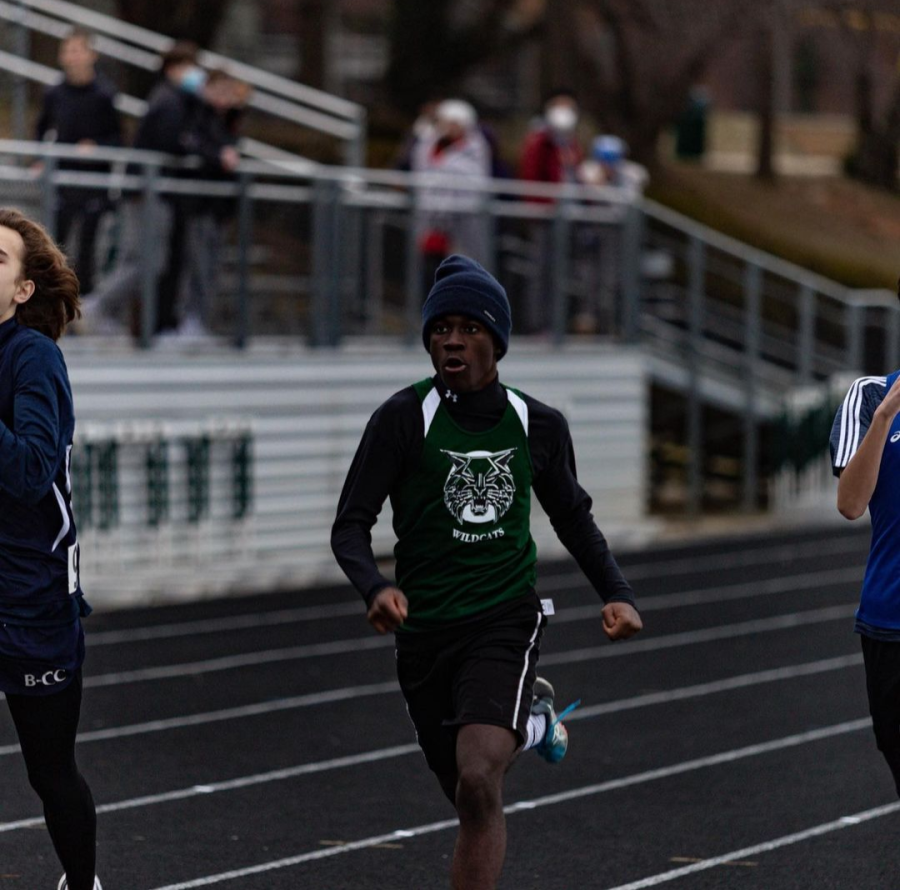 Sophomore+Sidney+Scale+runs+the+500+meters+against+Whitman%2C+Churchill+and+BCC.+Despite+the+temperatures+reaching+a+high+of+only+the+low+40s%2C+the+meet+was+held+outside+due+to+the+concerns+over+Covid-19.++Such+frigid+conditions+only+compound+the+intensity+of+the+competition.
