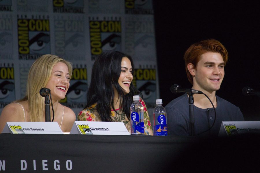 Actors Lili Reinhart, Camila Mendes and KJ Apa at the 2017 SDCC. Their hit show Riverdale was one of the first to start controversies within the audience about the age of their cast members.