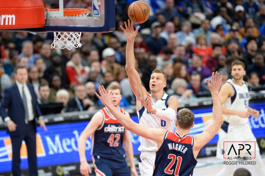 Kristaps Porzingis attempts a floater versus the Washington Wizards. Porzingis was traded to the Wizards at the deadline with the Wizards hoping to give Bradley Beal a star counterpart.