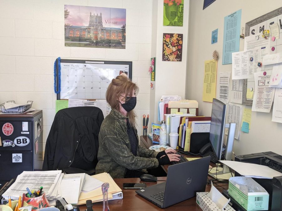 Counselor Audrey Weissberg works at her desk. The beginning of the semester is especially busy for counselors due to the volume of student schedule change requests.