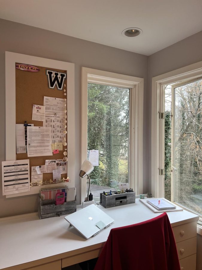 Senior Layla Pelon has a crystal clean desk set-up for her long days of virtual academy, complete with a MacBook, bulletin board, and plenty of school supplies. Without this space and mugs of coffee (not pictured), Pelon wouldnt be able to get through her school day.