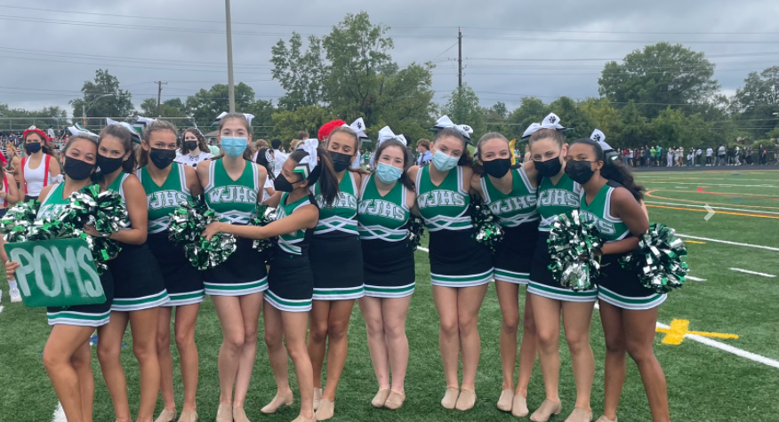 The Wildcats womens poms team prepares to perform at the 2021 fall pep rally. After the mens poms team performed at the spring pep rally in 2022, it was announced that they would perform at most home football games next year.