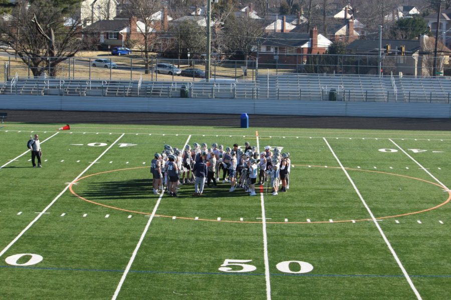 The WJ boys lacrosse team huddles up to start the spring season. As the first practices get started, a new bonding period between teammates forms.