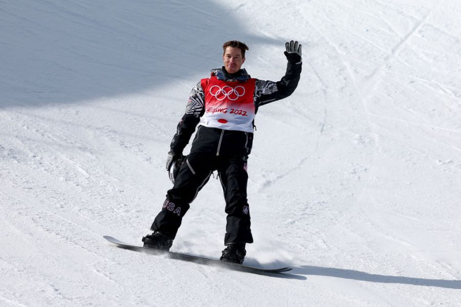 Shaun White waves to the crowd on his last Olympic run. White is one of the most beloved figures in pro snowboarding, credited for bringing the sport into the mainstream.