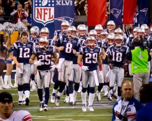 For 20 years, Tom Brady and Bill Belichick led the most dominant dynasty in football history. Here, the Patriots are seen taking the field in 2012 against the Giants for one of their nine super bowl appearances in the Brady-Belichick era.