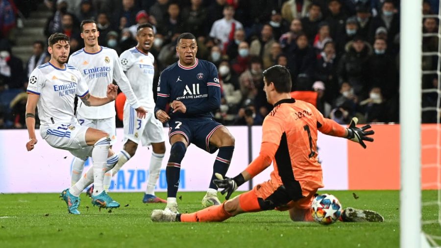 Kylian Mbappe scores a last-minute goal past goalkeeper Thibaut Courtois on  Feb. 15 in Paris, France.