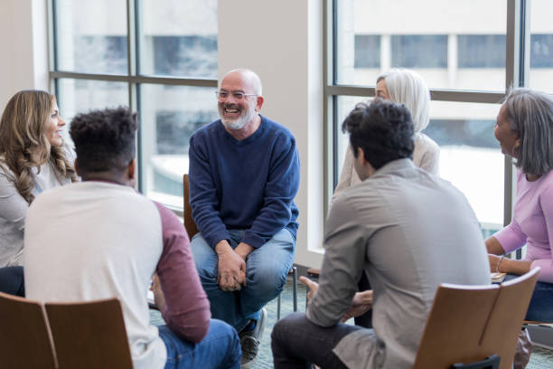 Freshman Francis Emerson, pictured above in the center, has started a support group club for those affected by the libel of The Pitch. In this meeting, they are discussing the idea of taking on separate identities to distance themselves from reputation their misattributed quotes have given them.