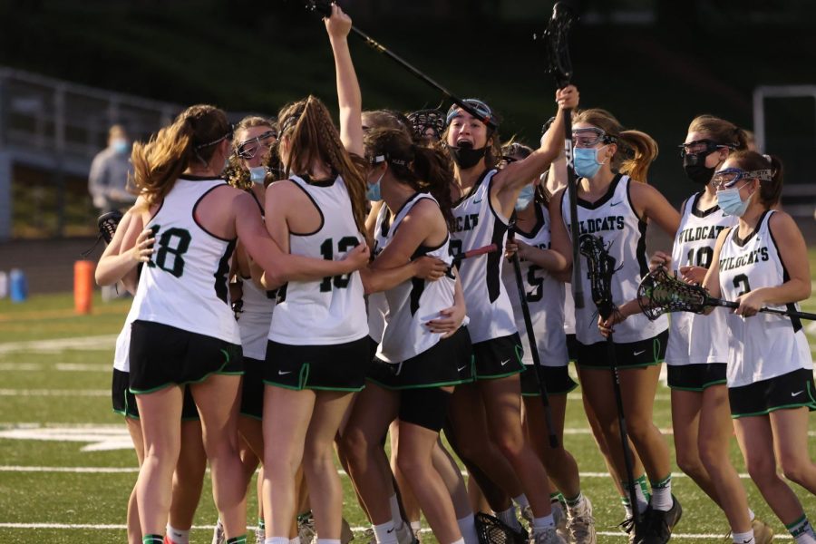 Varsity+girls+lacrosse+team+celebrates+after+winning+the+first+game+of+the+season+against+BCC+in+their+2020-2021+season.+BCC+has+been+one+of+their+biggest+competitors+leaving+high+expectations+for+the+team+to+perform+this+season.