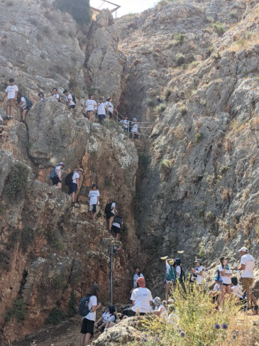 Junior Isaac Malka hikes Har Arbel (a mountain in Israel) alongside his study-abroad classmates.