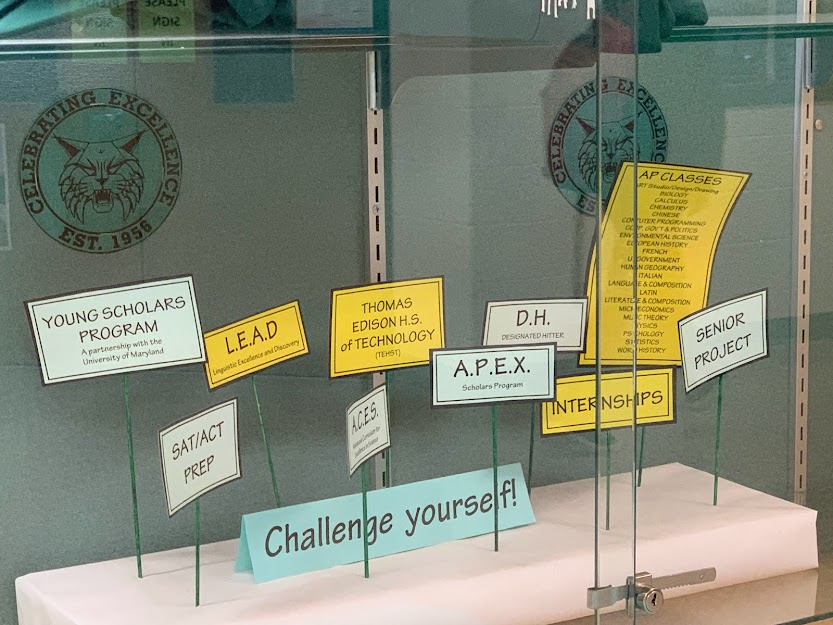 A number of extracurricular activities and educational opportunities are on display outside the counselors office. Students often feel great pressure to participate in one or more of them in order to strengthen their college application.