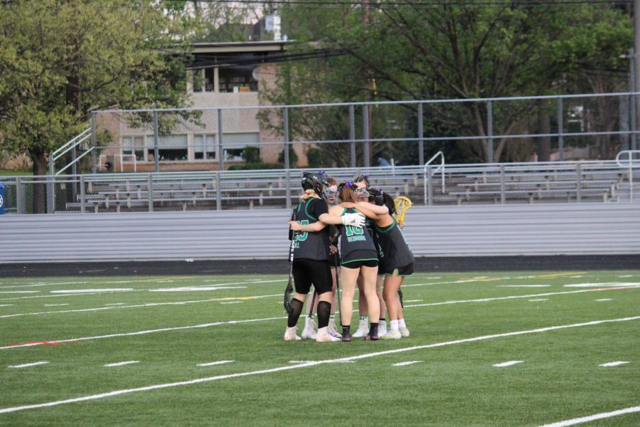The WJ girls lacrosse defense huddles and has a quick debriefing before entering the second half. In a joint effort they only allowed Clarksburg to score one goal.