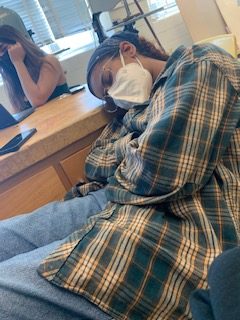 Junior Janaiyah Inniss overloaded with school work and extracurriculars, like WJ Crew, falls asleep during class.