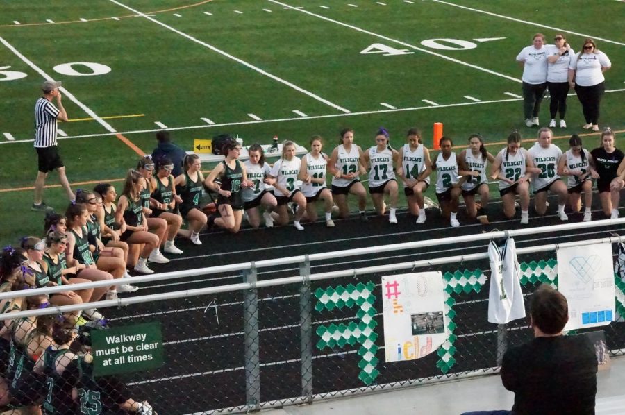 JV+and+varsity+girls+lacrosse+join+together+to+celebrate+the+life+of+catlax+alumni+Abby+Bieber.+Bieber+led+the+Wildcats+to+a+regional+championship+and+was+the+best+friend+of+varsity+head+coach+Colleen+Klipstein.
