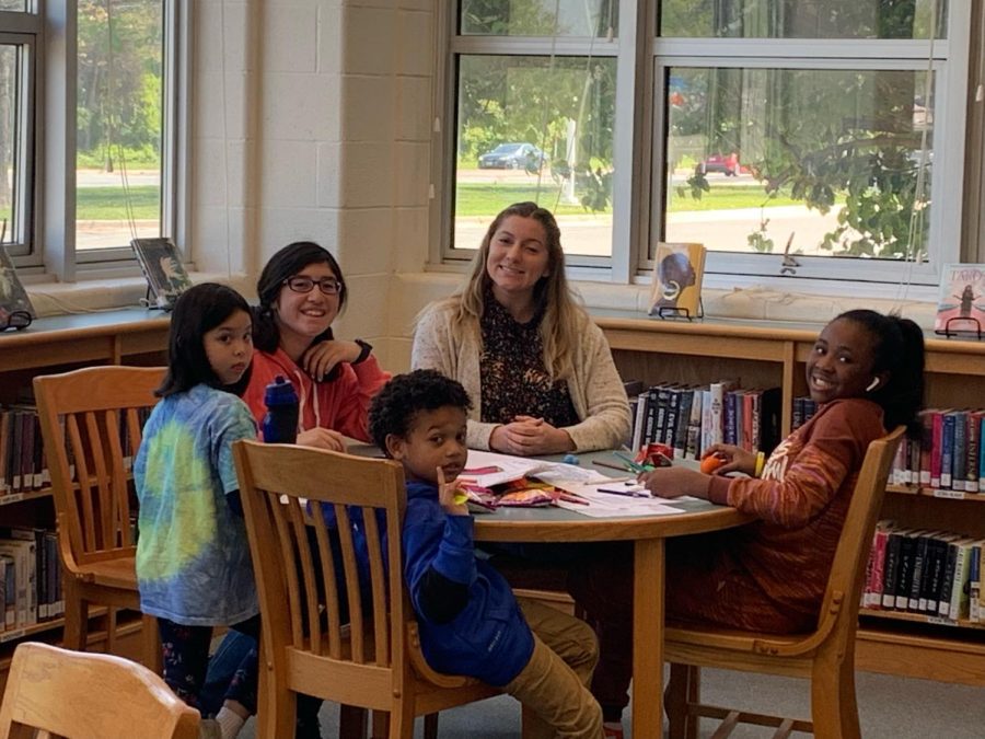 Guests Cynne Brown, DAngelo Gaskins, Kelani Lawn, and Makayla Campos enjoy one of the may planned activities in the Media Center.