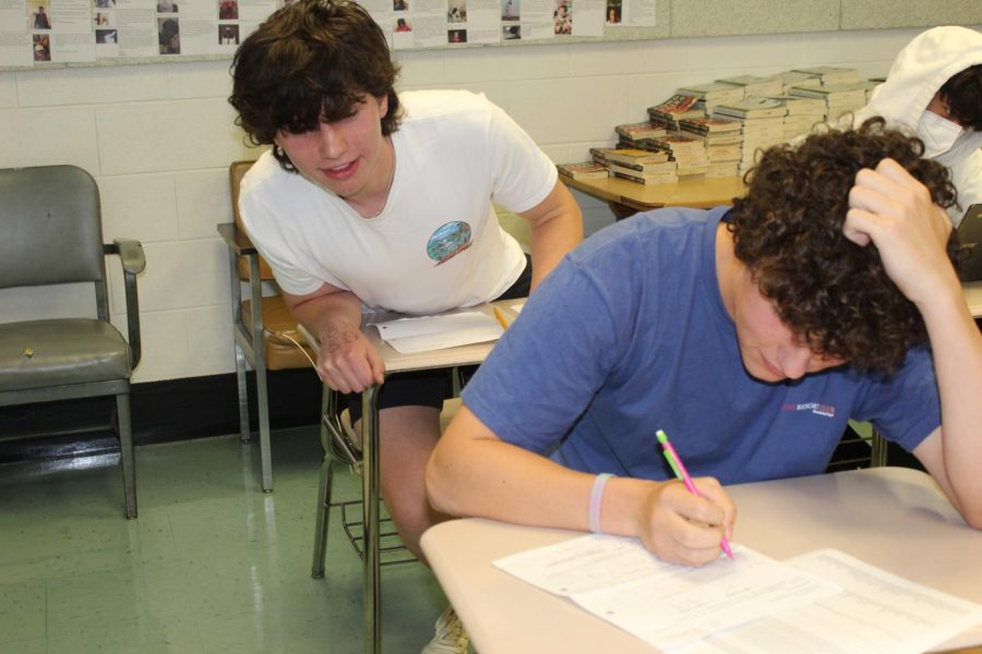 Dramitization of sophomores Torben Mucchetti and Erik Austengard cheating on an assignment. The students were not participating in academic dishonesty.