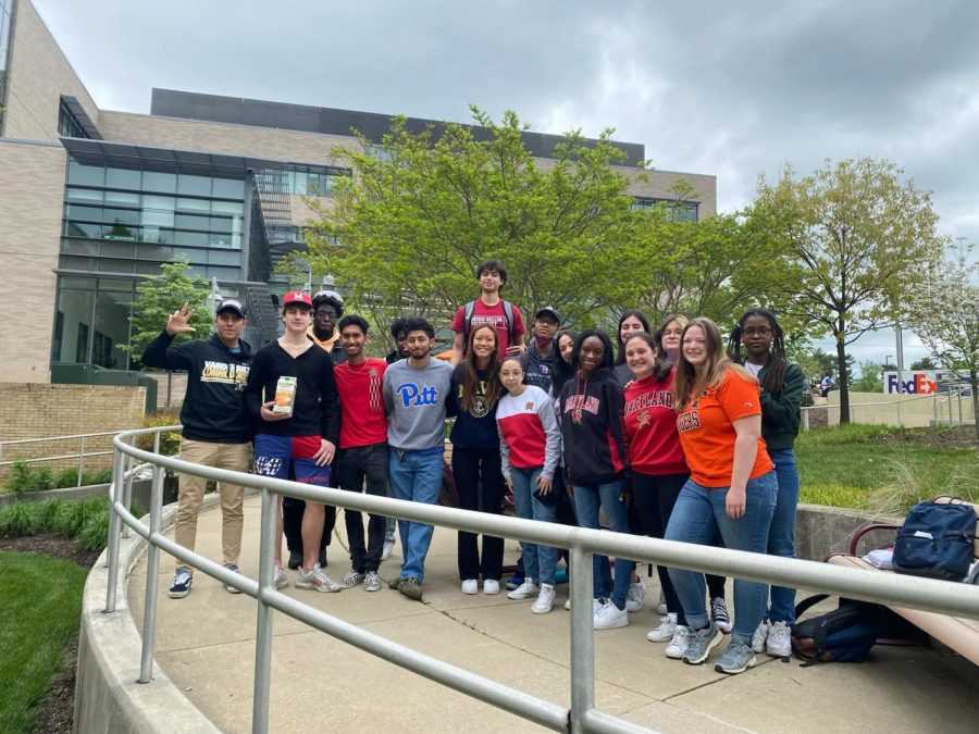 Senior Rafael Isea (back row) poses with other business students in the MC Early College Program on May 5, their last day of classes. Isea credits a lot to the program in helping him develop his interests. I feel like I have grown a lot in early college. I have really matured and refined my skills to be better prepared for what I want to do in the future regarding finance because I have cultivated networking and just interpersonal skills, Isea said.