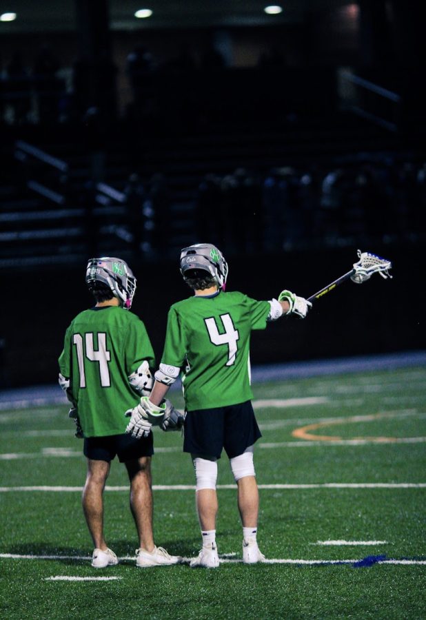 Seniors Will Dash and J.P Rakis strategize their next attack in a game against Walt Whitman. WJ went on to win this game in overtime with the game-winner coming from Rakis.