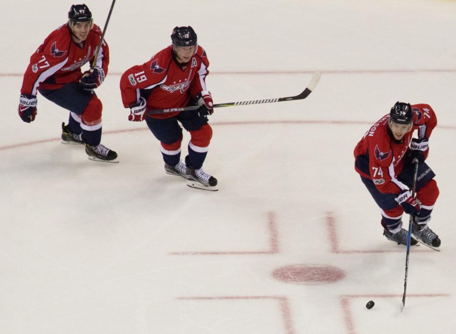 Capitals forwards T.J. Oshie, Nicklas Backstrom and John Carlson participate in a drill during practice. All three forwards are expected to play in the Capitals first game of the playoffs.