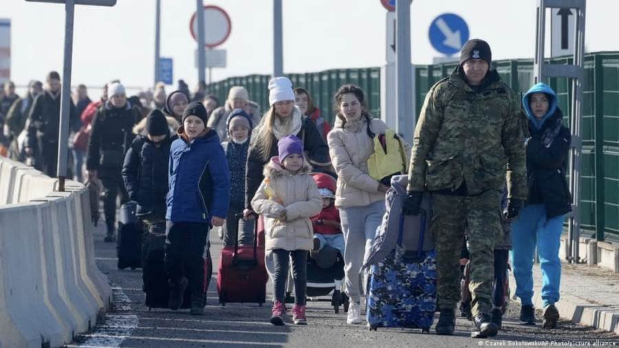 At one point, there were almost 13 million Ukrainians that were displaced because of the Russian invasion of Ukraine. In this photo, refugees are crossing the border to Poland. Many refugees want to go back to their home country and get their ordinary lives again.
