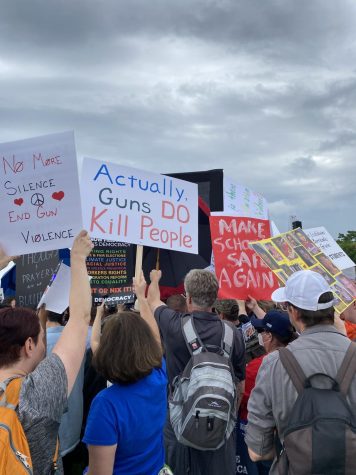 Protesters gather at the March for Our Lives protest on Saturday, June 11. The protest was in response to the deadly school shooting in Uvalde as well as other mass shootings in recent weeks.